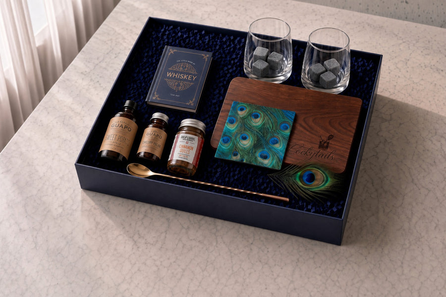 Peacock Reserve gift box with grey stones in the glasses